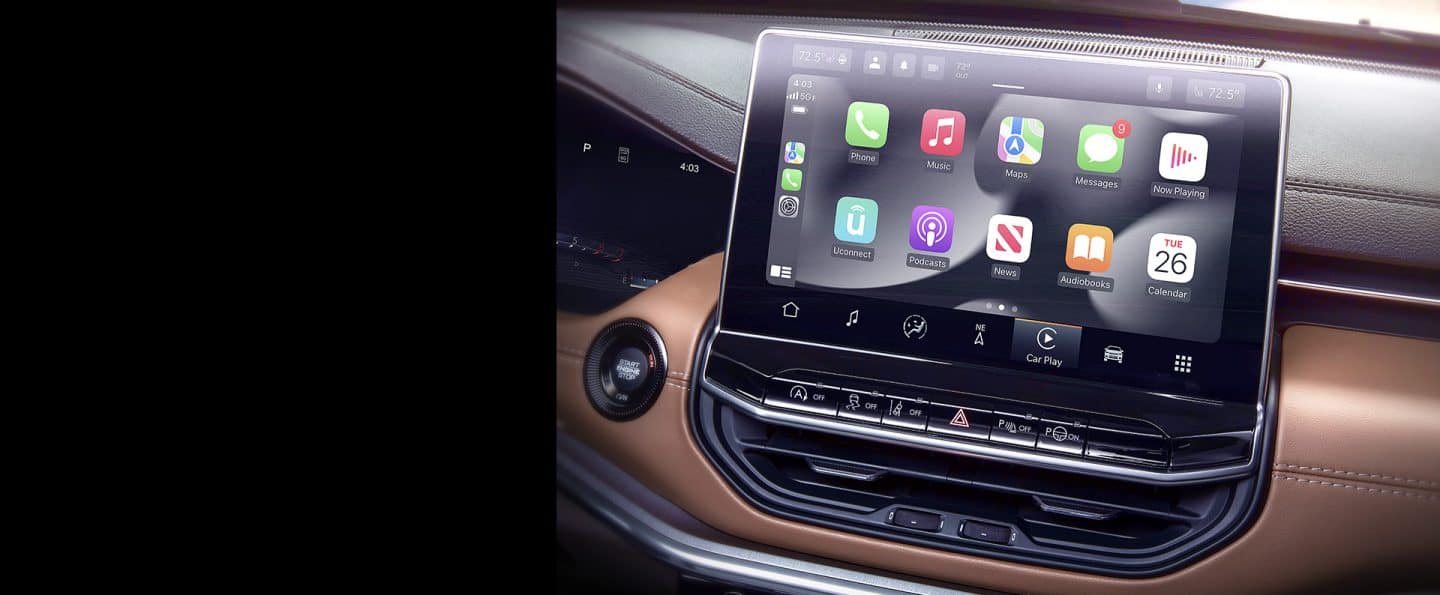 A close-up of the Uconnect touchscreen in the 2023 Jeep Compass Limited.