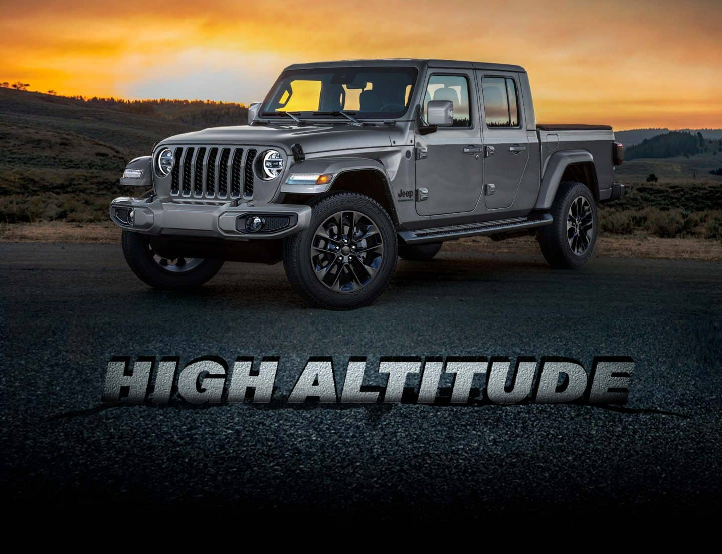 High Altitude. Perfil tres cuartos frontal de la Jeep Gladiator High Altitude 2023 al amanecer.