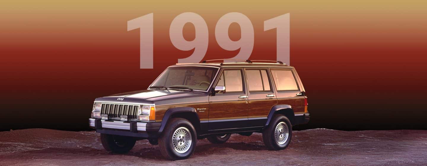 Un Jeep Cherokee Briarwood negro clásico con paneles laterales con veteado de madera. 1991.