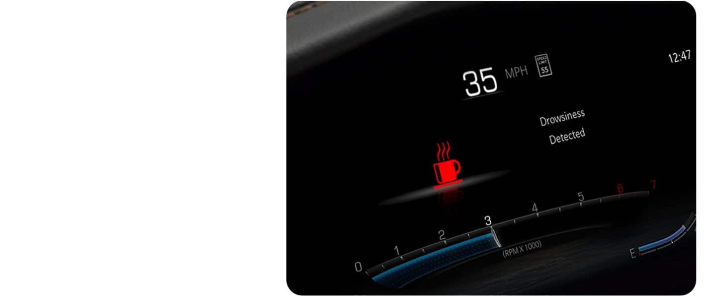 La alerta de conductor somnoliento se observa en el tablero digital del Jeep Grand Cherokee 2026.