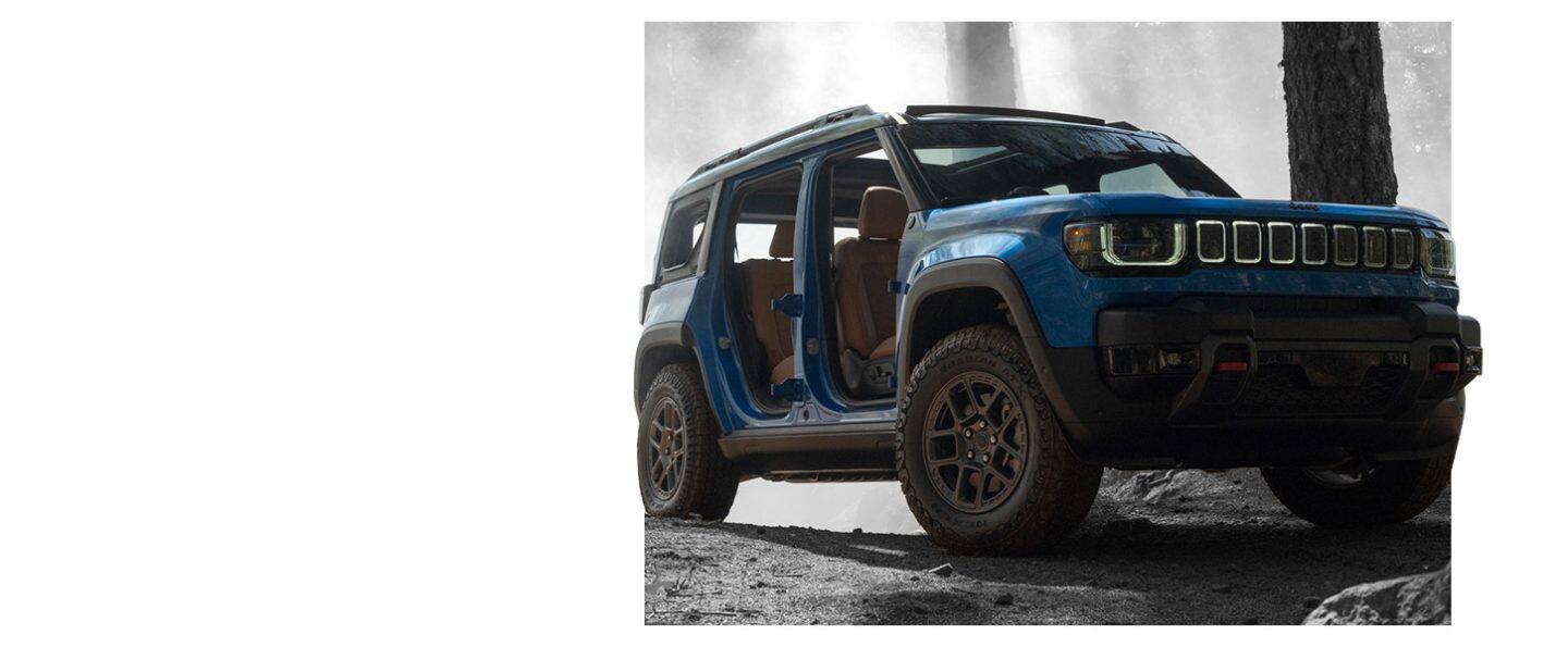 A blue 2026 Jeep Recon Moab with its doors removed.