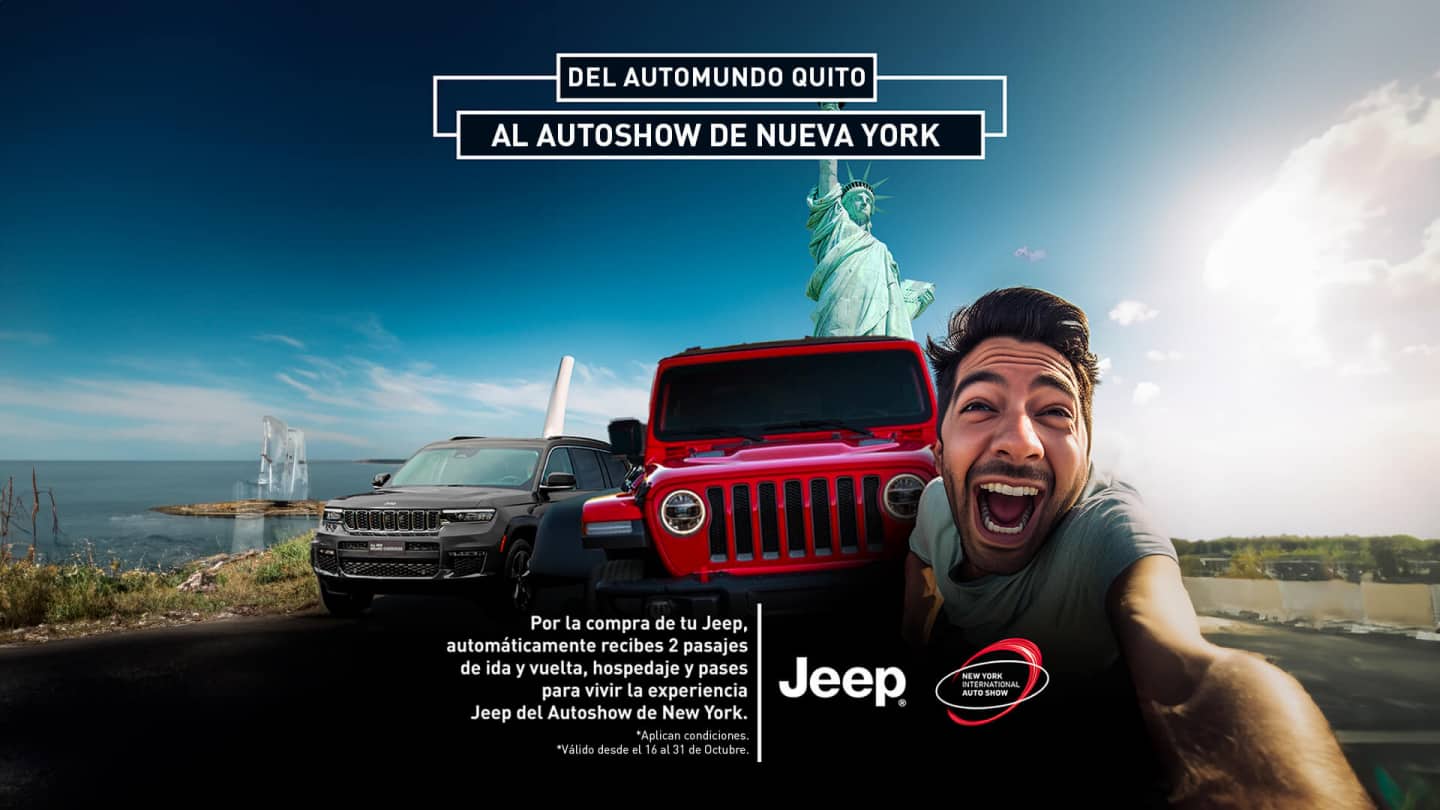 A 2024 Jeep Wrangler Rubicon 4xe with its doors and roof removed, being driven on a sandy trail off-road, with huge boulders on both sides.