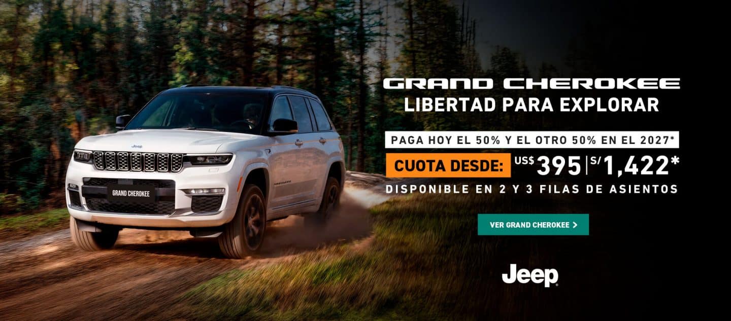 Jeep Grand Cherokee color gris en el bosque