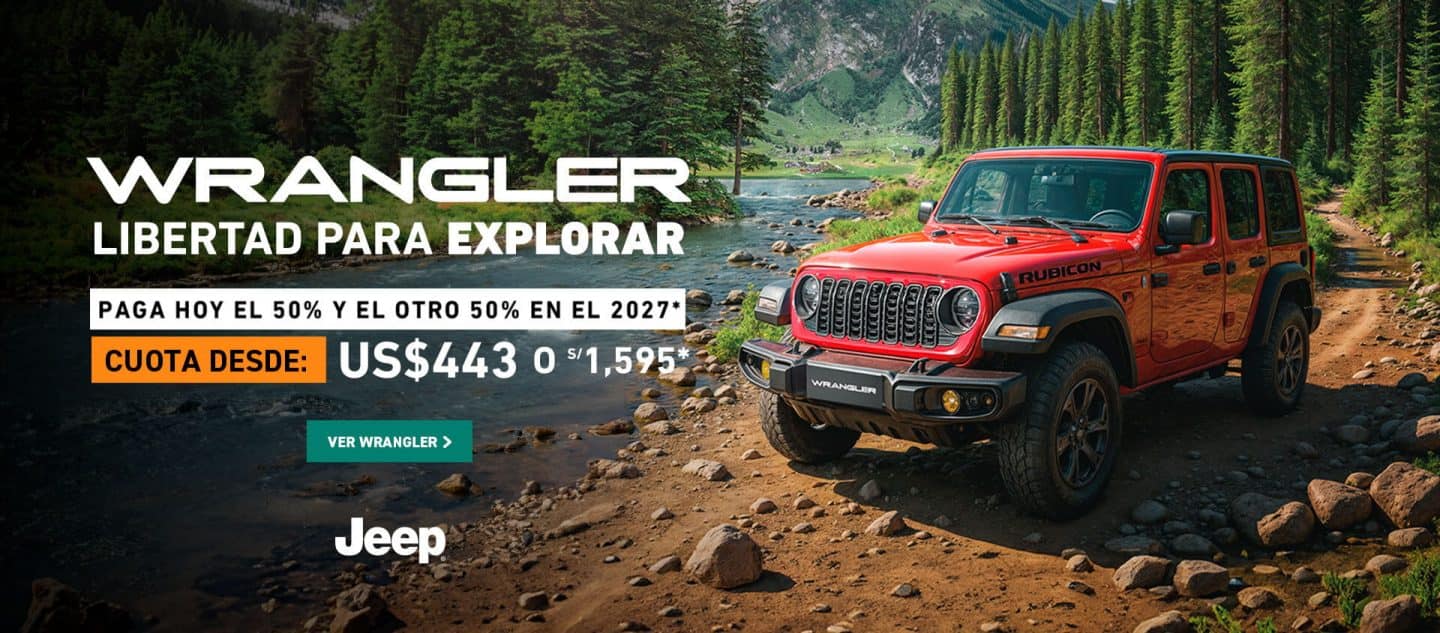 Jeep Wrangler todoterreno color rojo al lado de un río