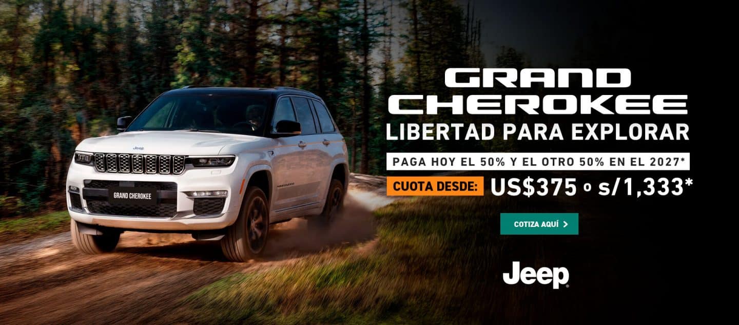 Jeep Grand Cherokee color gris en el bosque