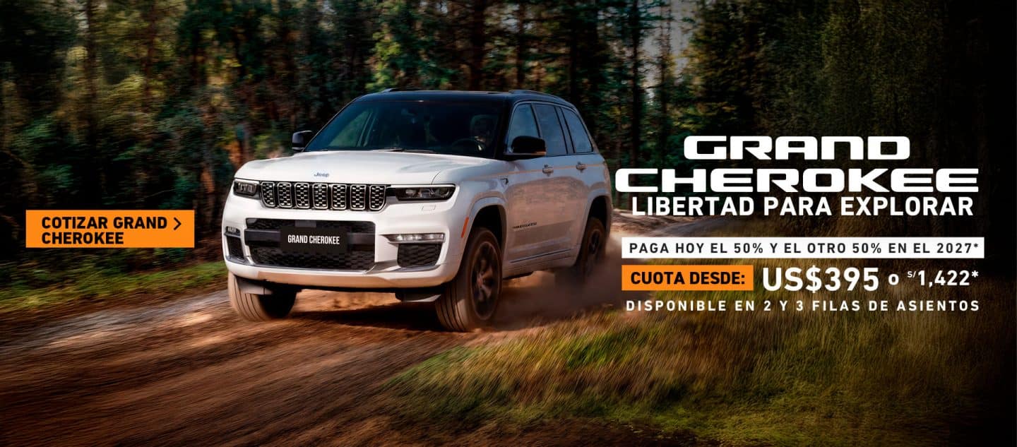 Jeep Grand Cherokee color gris en el bosque