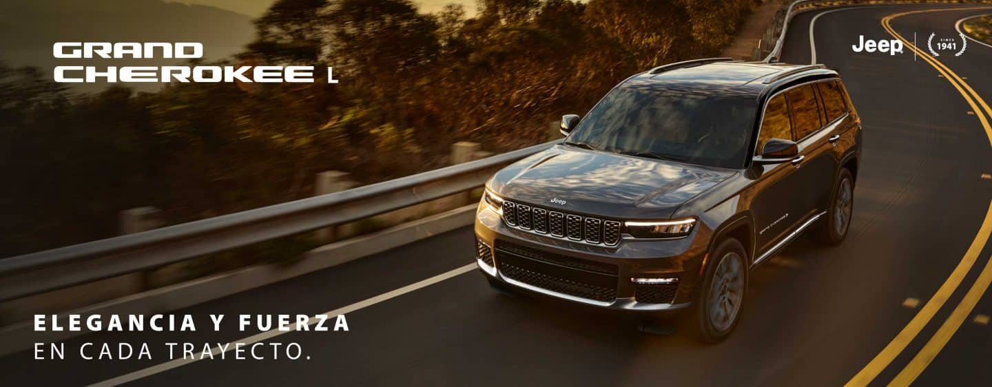 The interior of the 2023 Jeep Grand Cherokee L Summit, with all the second- and third-row seats folded flat.