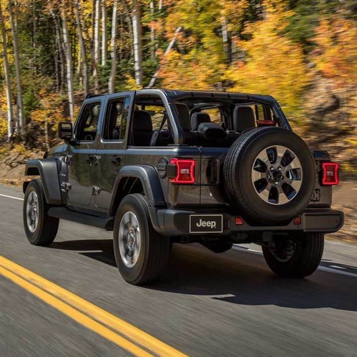 Jeep Wrangler 4xe Driving on Forest Road