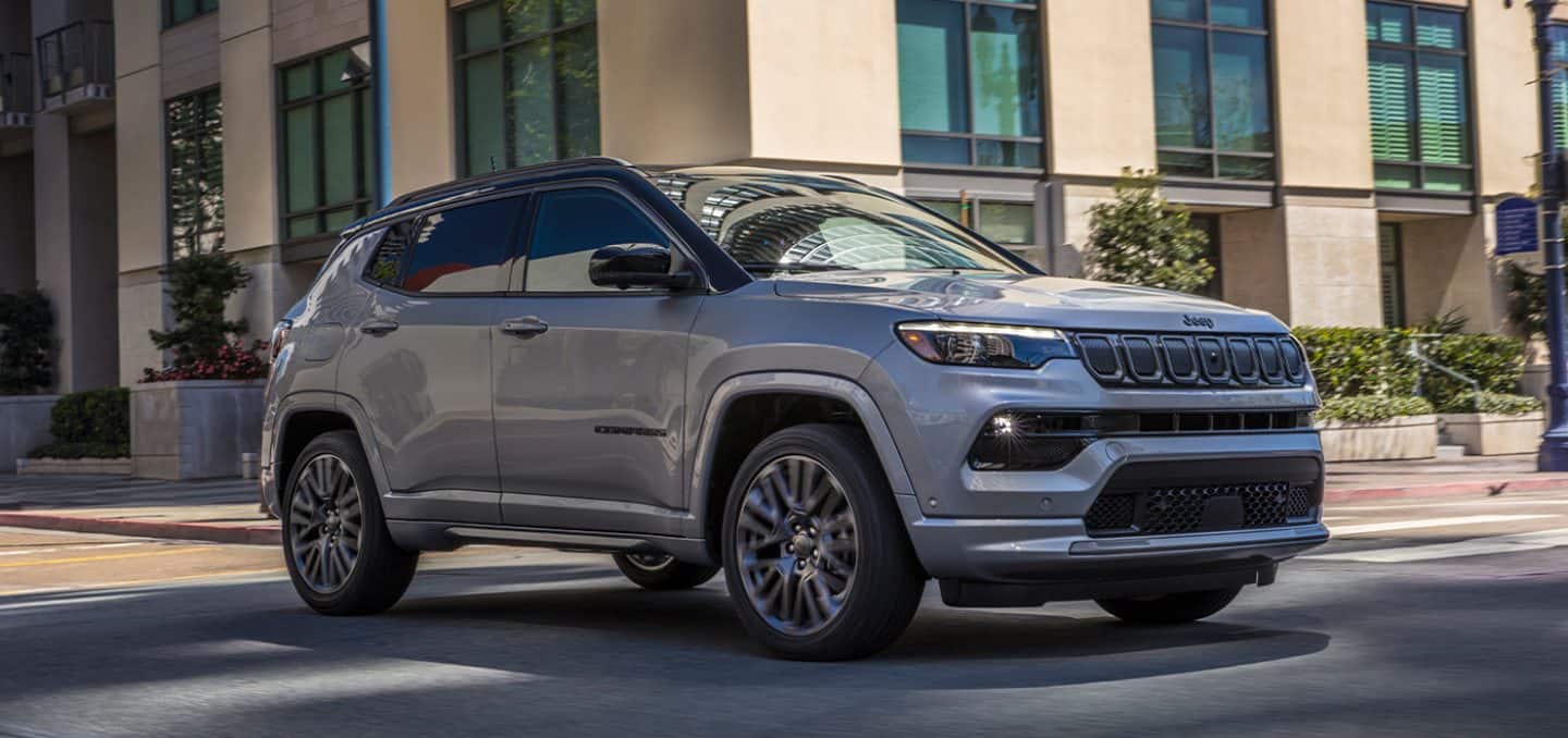 Display A three-quarter view of the 2022 Jeep Compass High Altitude, showing off exterior details like the grille and front fascia.