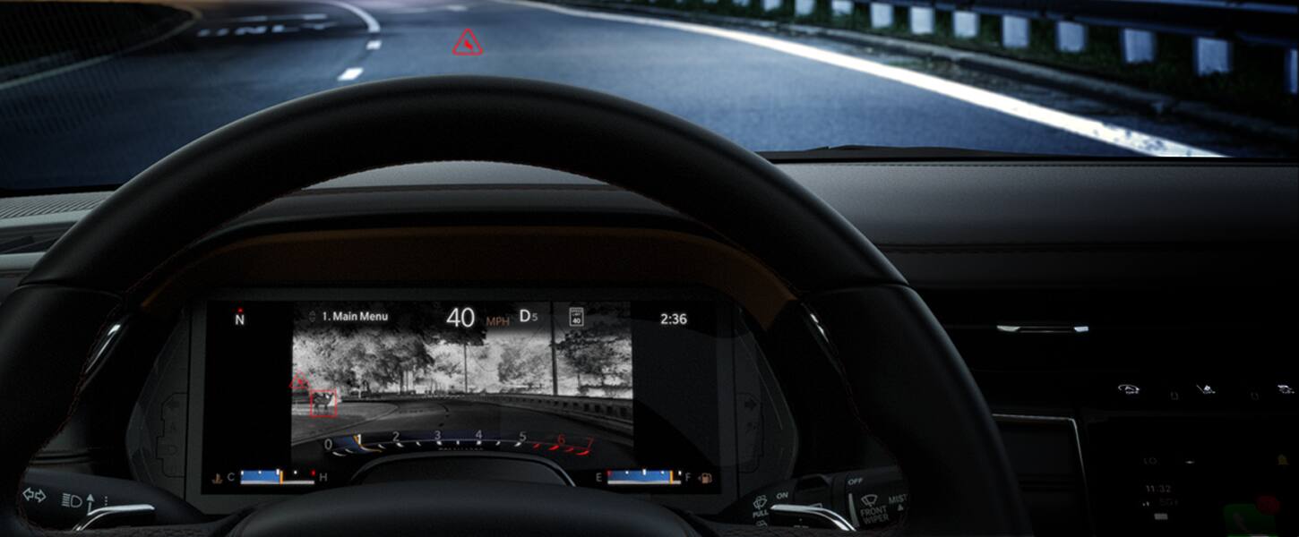 The Driver Information Digital Cluster inside the 2022 Jeep Grand Cherokee presenting the night vision camera display. 