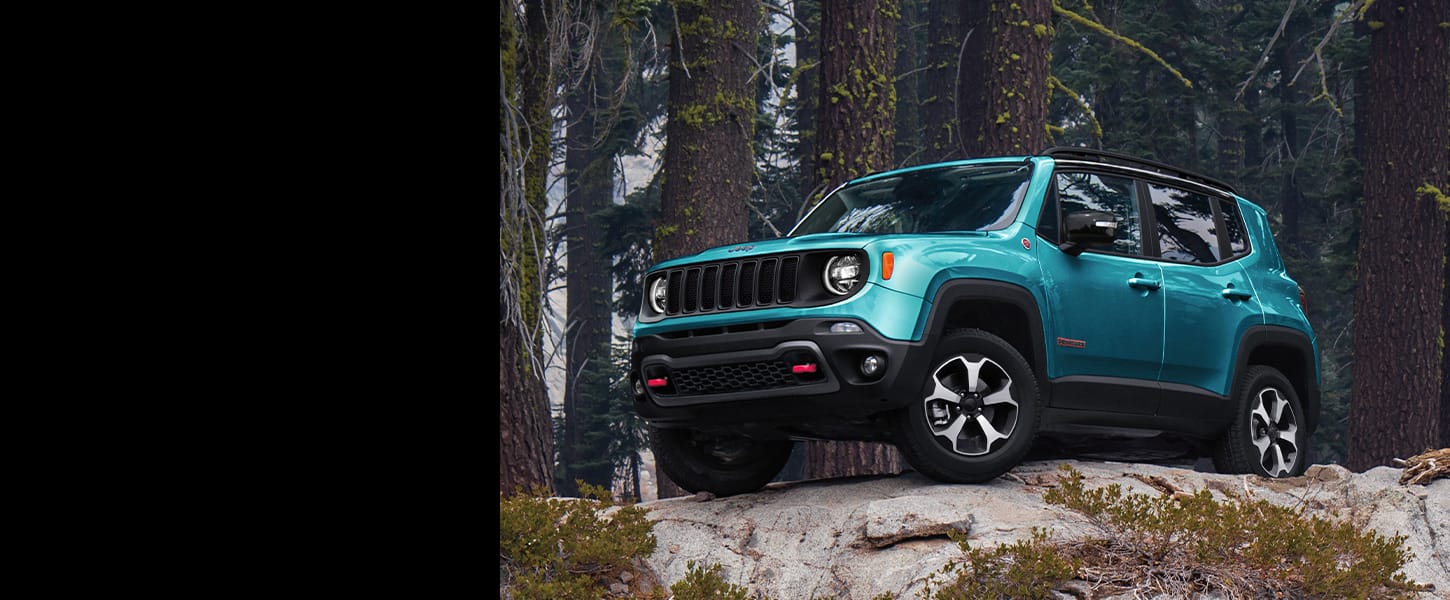 The 2022 Jeep Renegade Trailhawk parked on a rocky outcropping.