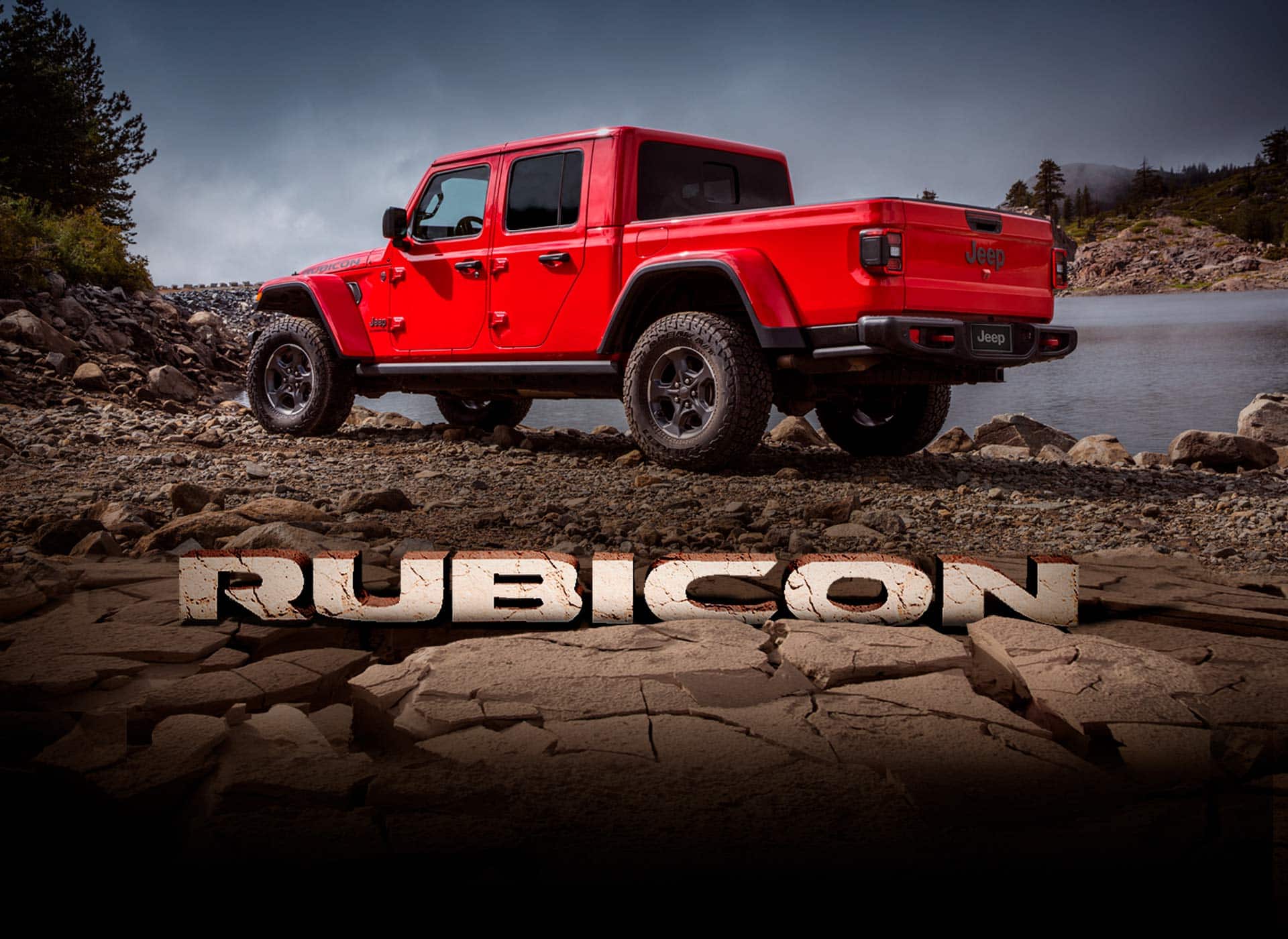 Rubicon. The 2022 Jeep Gladiator Rubicon parked on a pebbled riverbank.