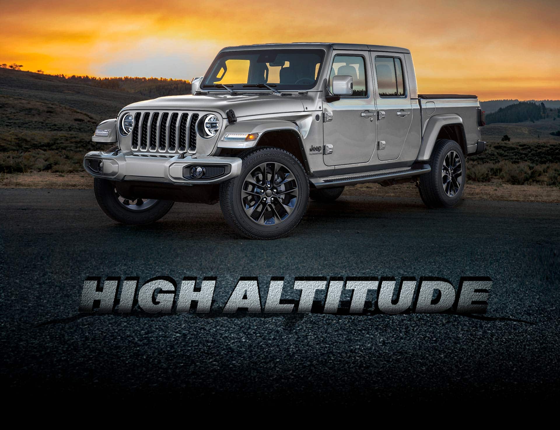High Altitude. Perfil tres cuartos frontal de la Jeep Gladiator High Altitude 2022 al amanecer.