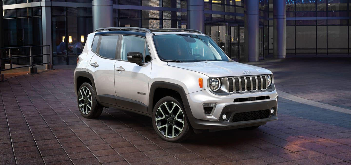 A three-quarter front profile of the 2022 Jeep Renegade Limited, parked in an open plaza.