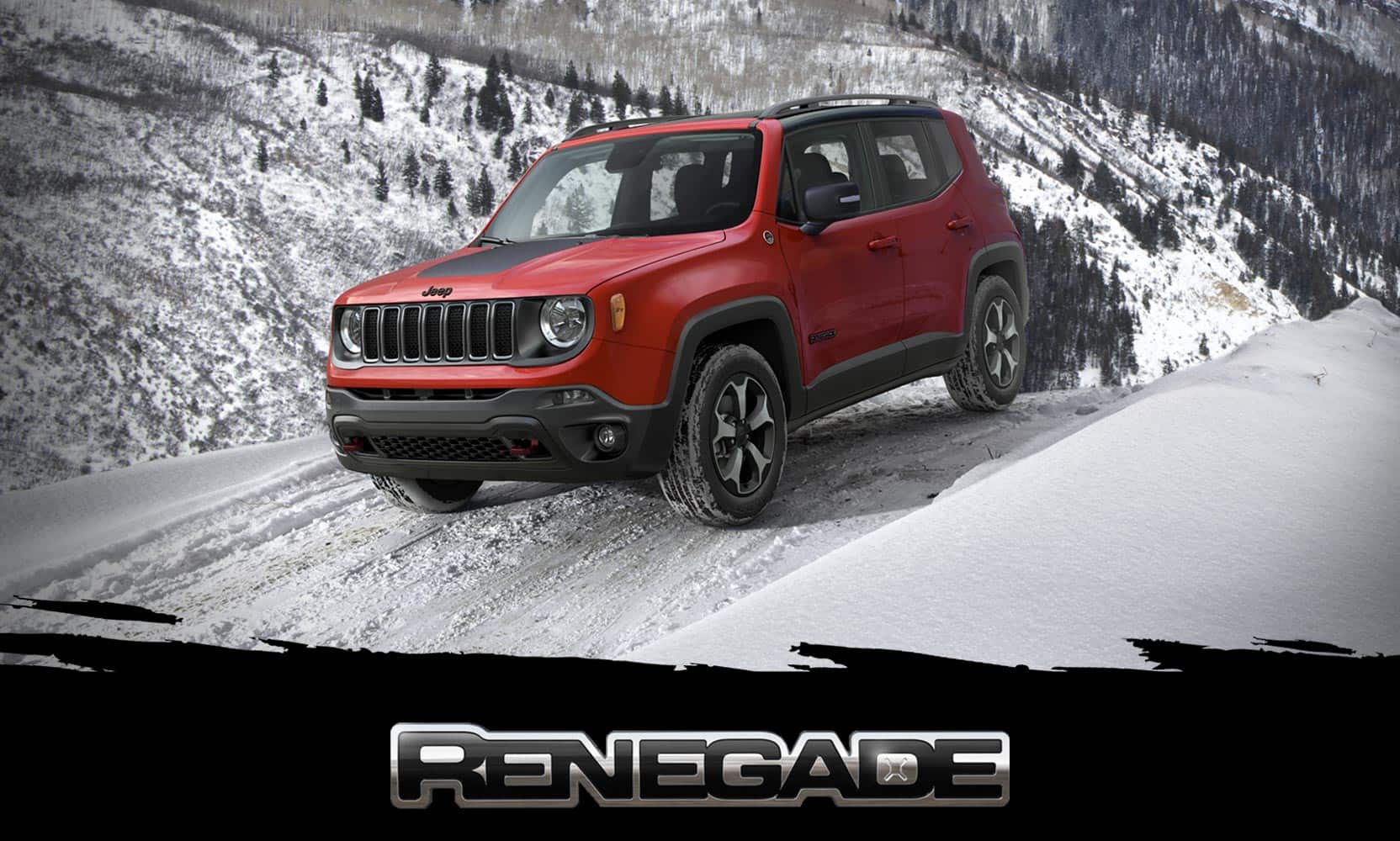 A red 2022 Jeep Renegade Trailhawk being driven over snow beside a mountain. Renegade.