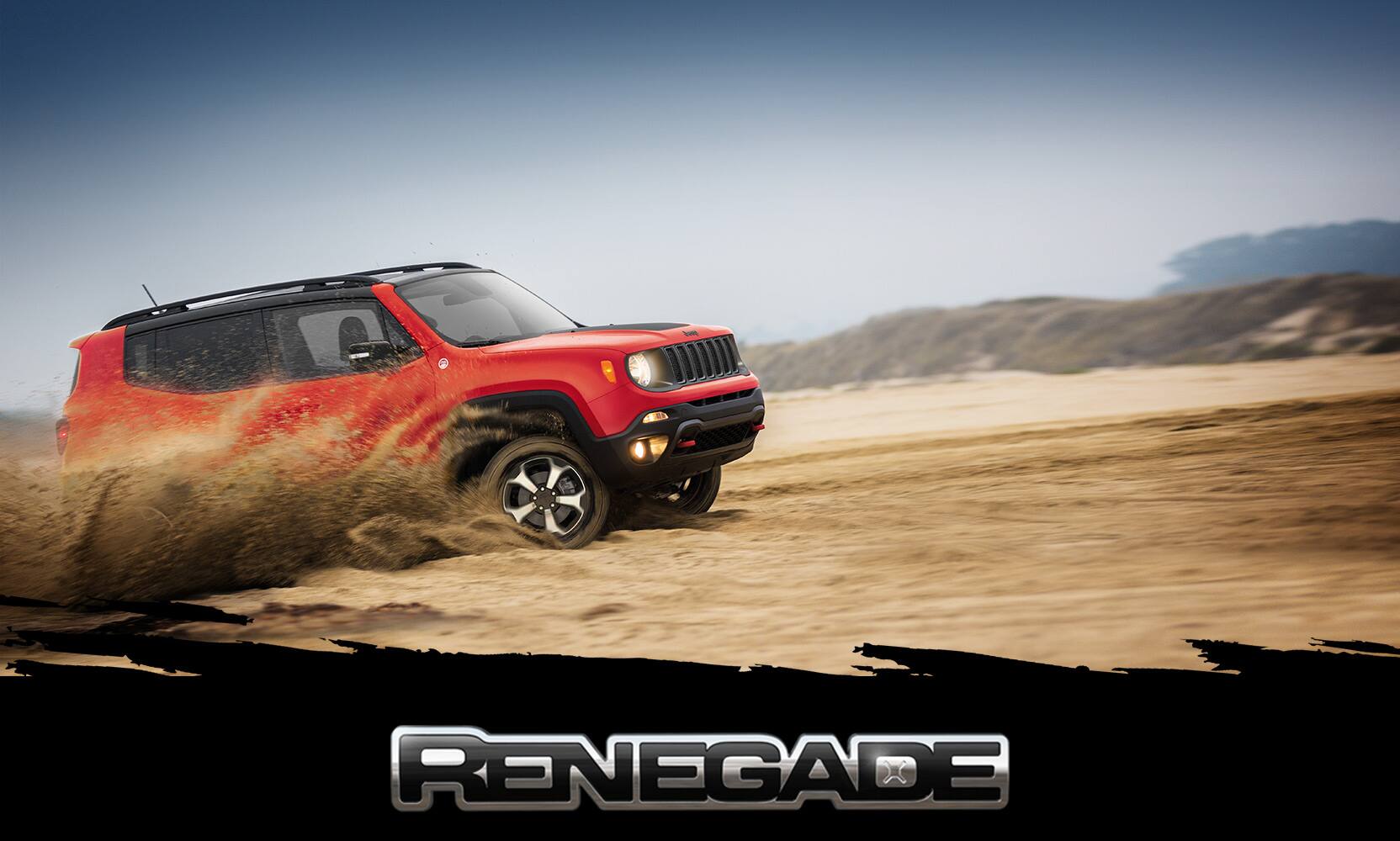 The 2023 Jeep Renegade Trailhawk being driven off-road in the desert with a spray of sand coming from its wheels. Make this the summer event.