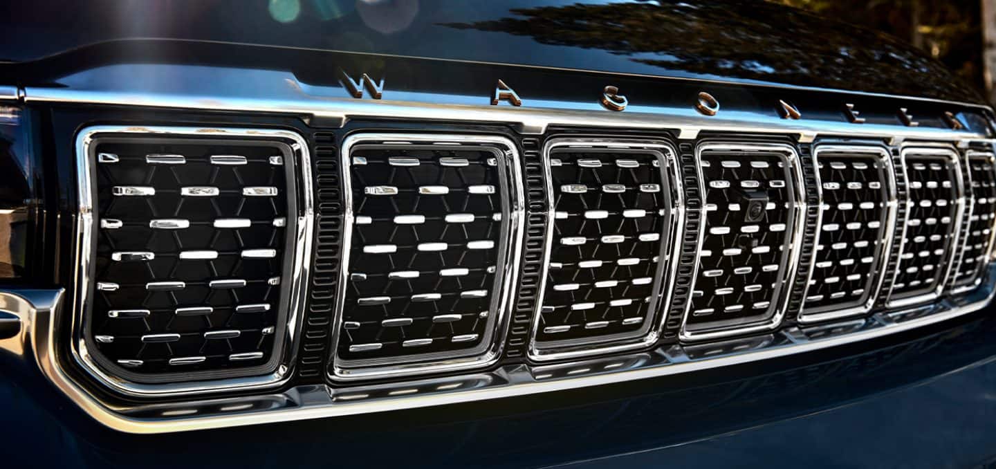 Display A close-up of the seven-slot grille on the front of the 2022 Grand Wagoneer.