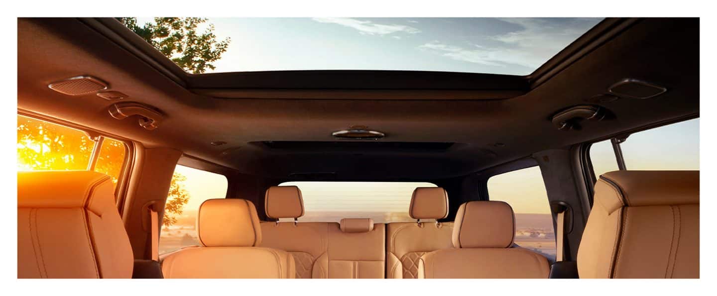 The interior view of the opened sunroof on the 2022 Grand Wagoneer.