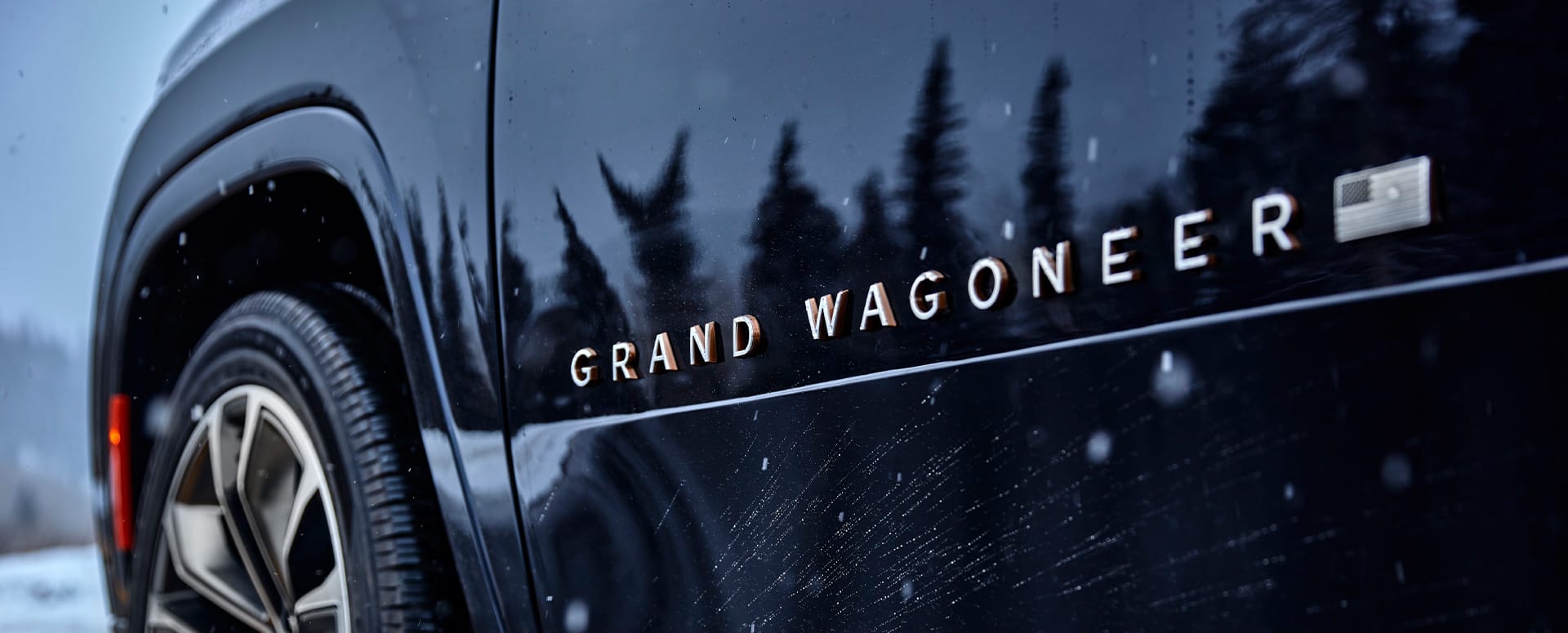 A close-up of the Grand Wagoneer badging on the All-New 2022 Jeep Grand Wagoneer.