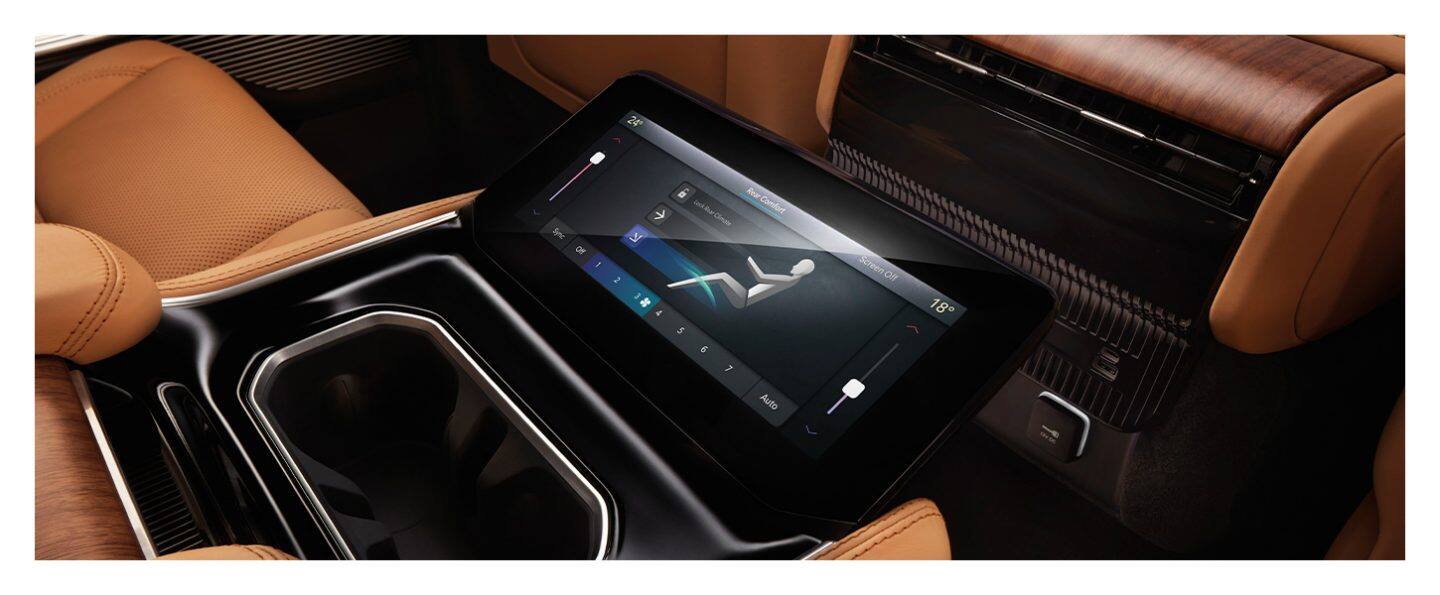 A close-up of the touchscreen in the second row console in the 2023 Grand Wagoneer Series III that allows passengers to adjust the climate controls.
