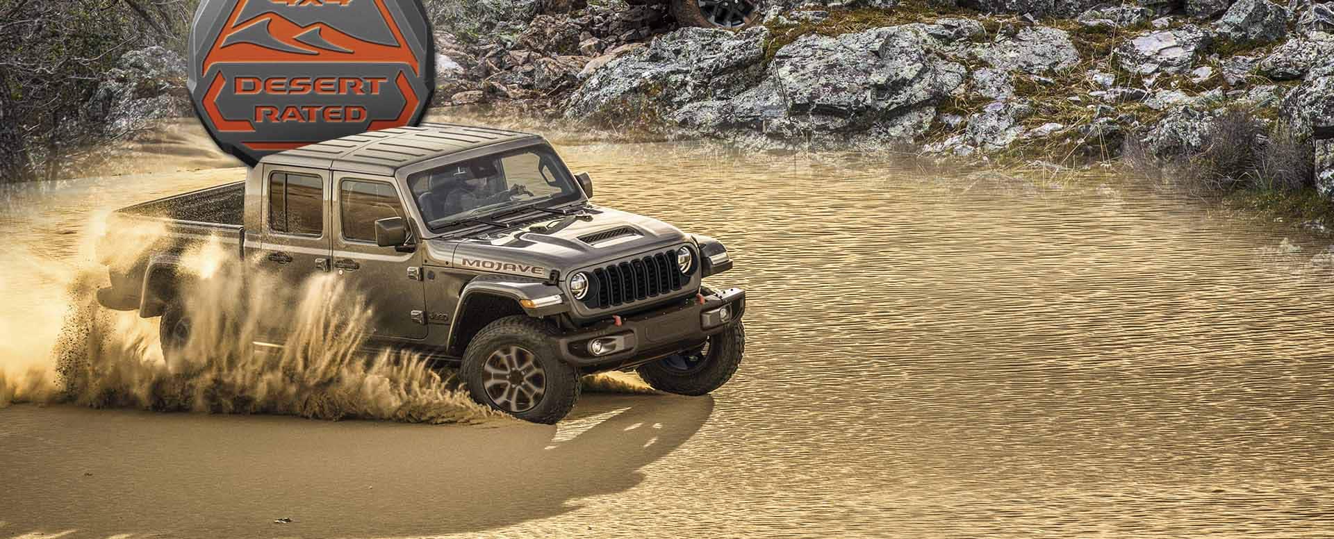 Two blended images: On the upper right, a red 2024 Jeep Gladiator Rubicon with its roof removed, descending a rocky, muddy trail off-road. TheTrail Rated 4x4 badge. On the lower left, a silver 2024 Jeep Gladiator Mojave kicking up sand as it is driven across a desert plain. The 4x4 Desert Rated badge.