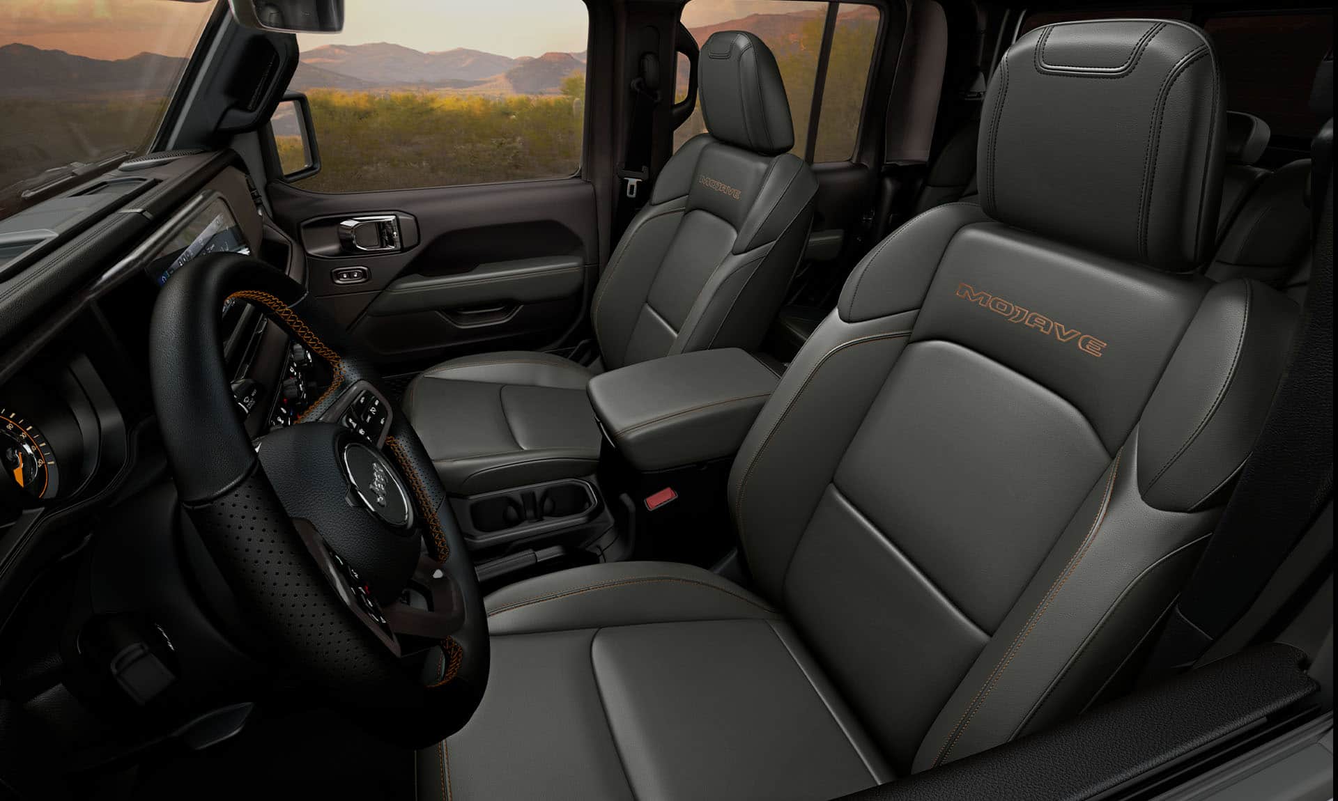 The front seats in the 2024 Jeep Gladiator Mojave.