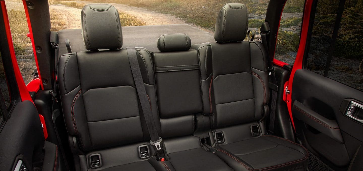 Display The rear seats in the 2024 Jeep Gladiator Rubicon.