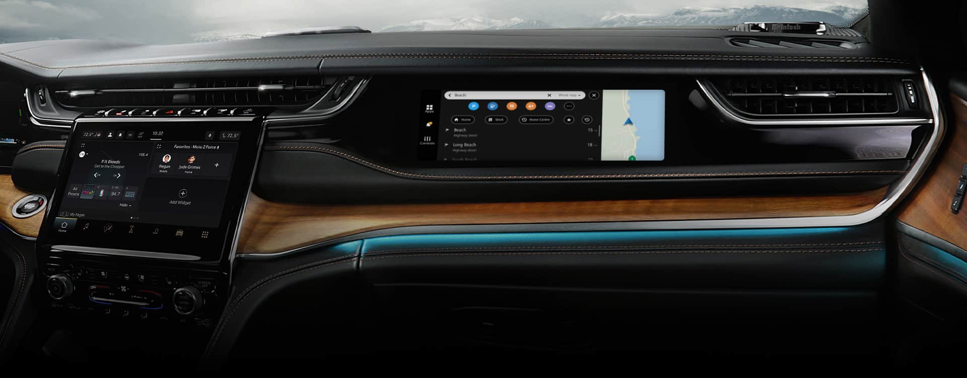 The front passenger interactive display and ambient blue LED lighting running across the dash in the 2024 Jeep Grand Cherokee Summit Reserve.