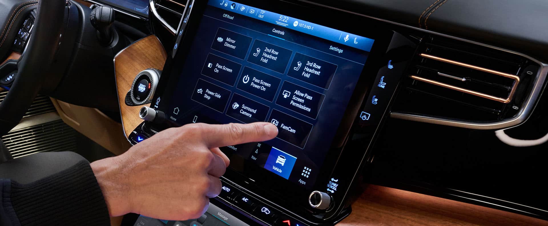 The Uconnect touchscreen in the 2024 Grand Wagoneer with a variety of vehicle controls displayed as the driver selects the FamCam.