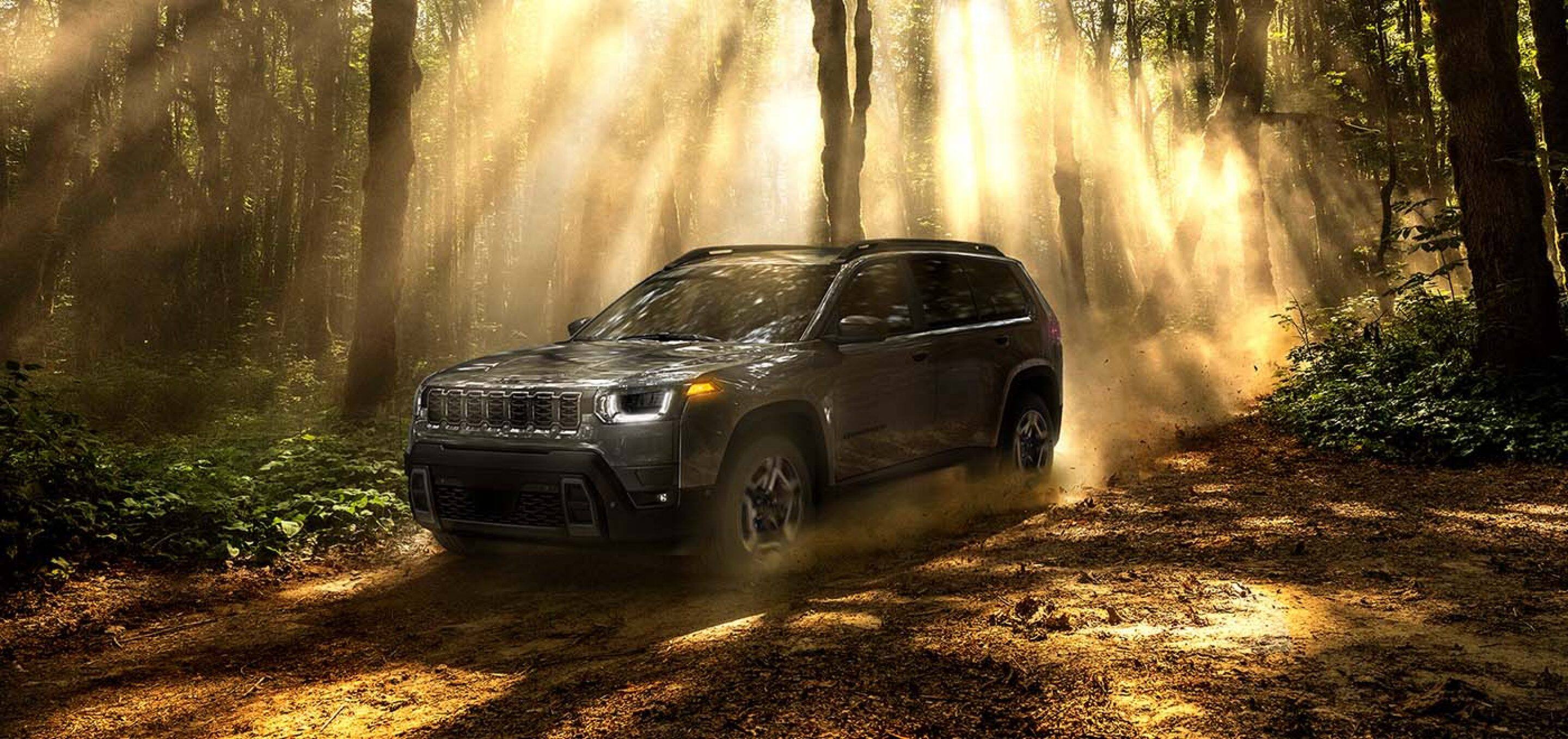 2026 jeep cherokee parked in forest