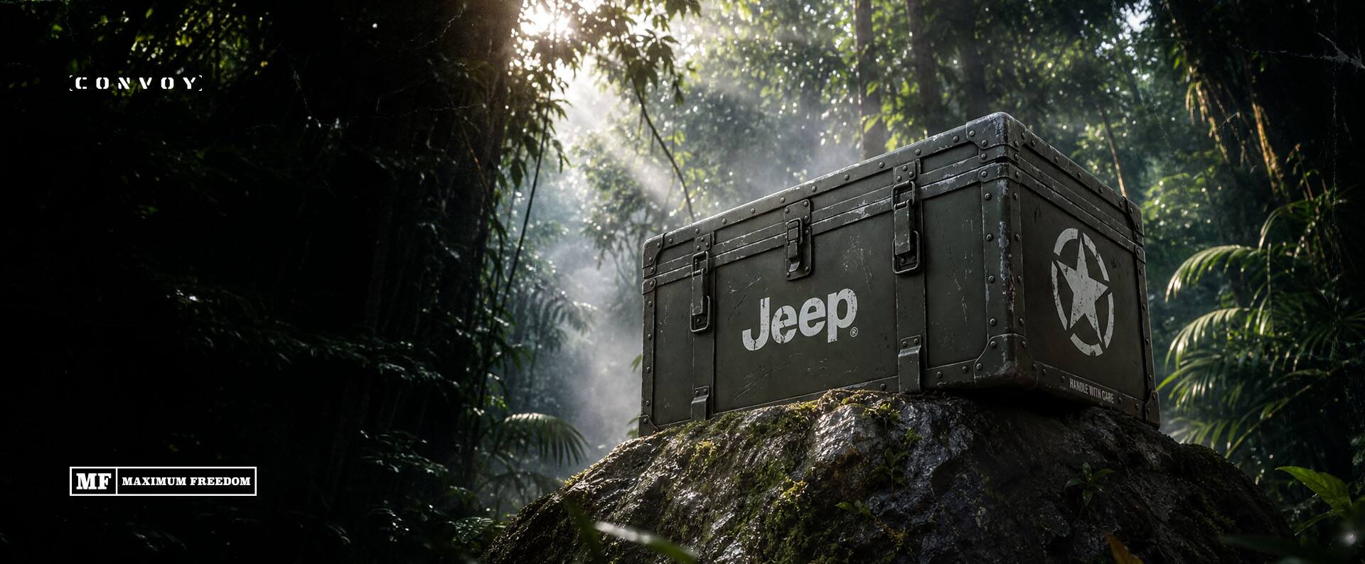 An olive drab crate with the Jeep logo and World War 2 Circle Star imprinted on it, sitting on a boulder in the jungle. Convoy. MF. Maximum Freedom.