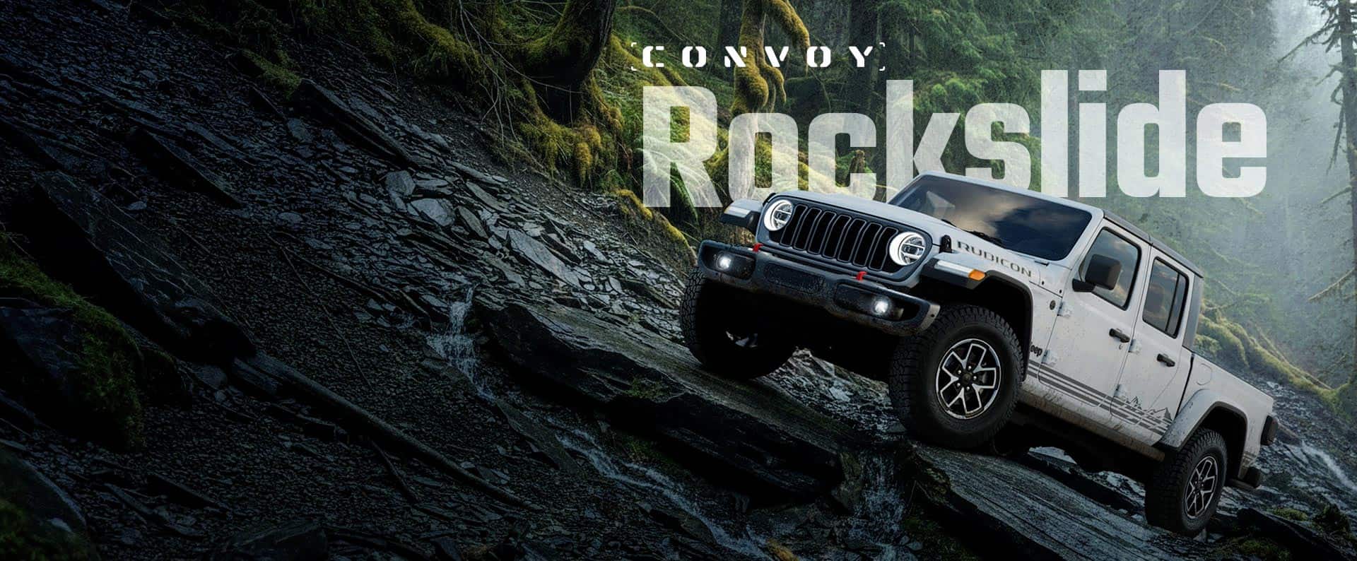 A white 2026 Jeep Gladiator Rubicon Rockslide crawling over a steep, rocky trail off-road. Convoy. Rockslide.