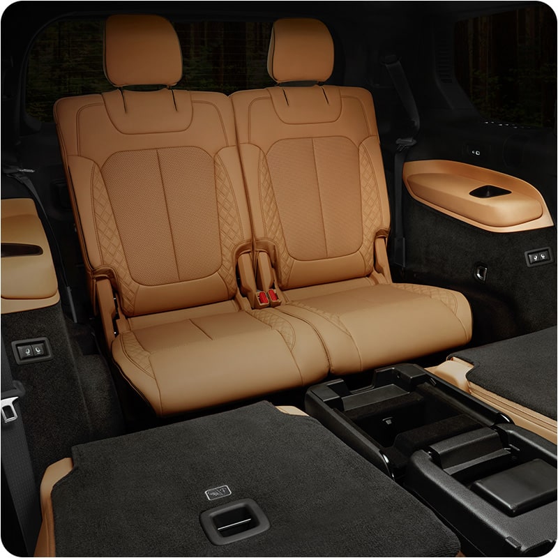 SUV interior with second and third row seats folded flat for maximum cargo space