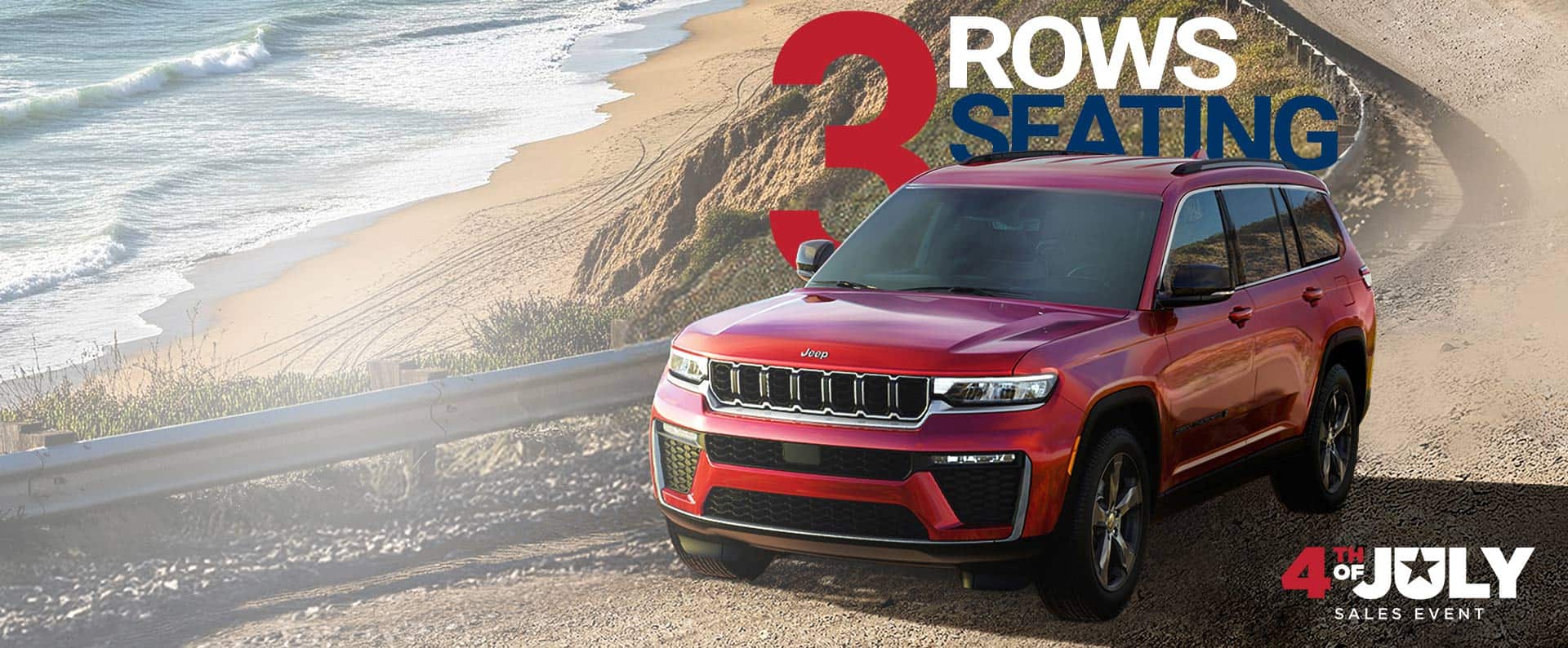 Un Jeep Grand Cherokee Limited 2026 rojo estacionado en una playa cerca de la costa. + de 520 millas. Evento de ventas del 4 de julio.