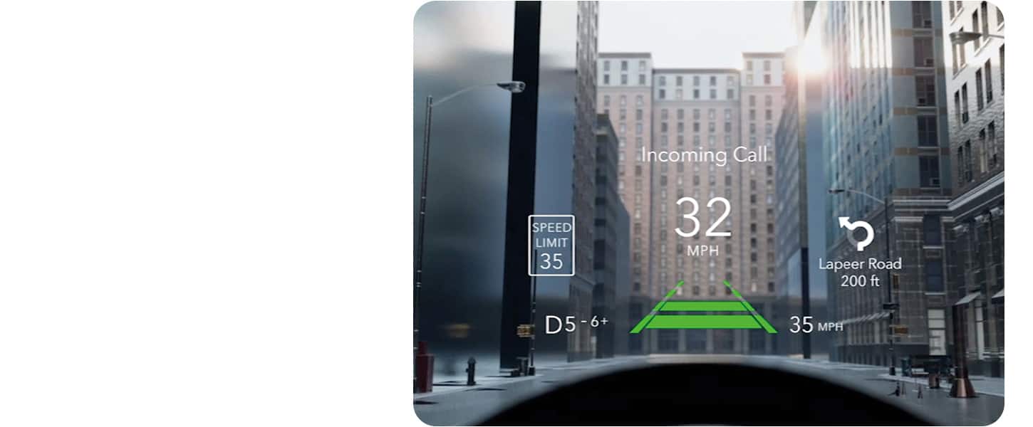 The current speed limit, vehicle's speed, upcoming navigation and incoming call, all displayed on the windshield of the 2026 Jeep Grand Cherokee with the Head-Up Display.