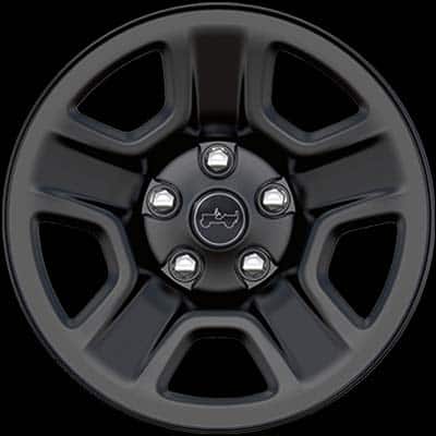 The first of eight identical 2026 Jeep Wrangler models with their doors and tops removed, and only their wheel designs and trims or colors changing. Here, a black 2026 Jeep Wrangler Sport four-door with black steel styled wheels. The seven remaining wheel designs are selectable.