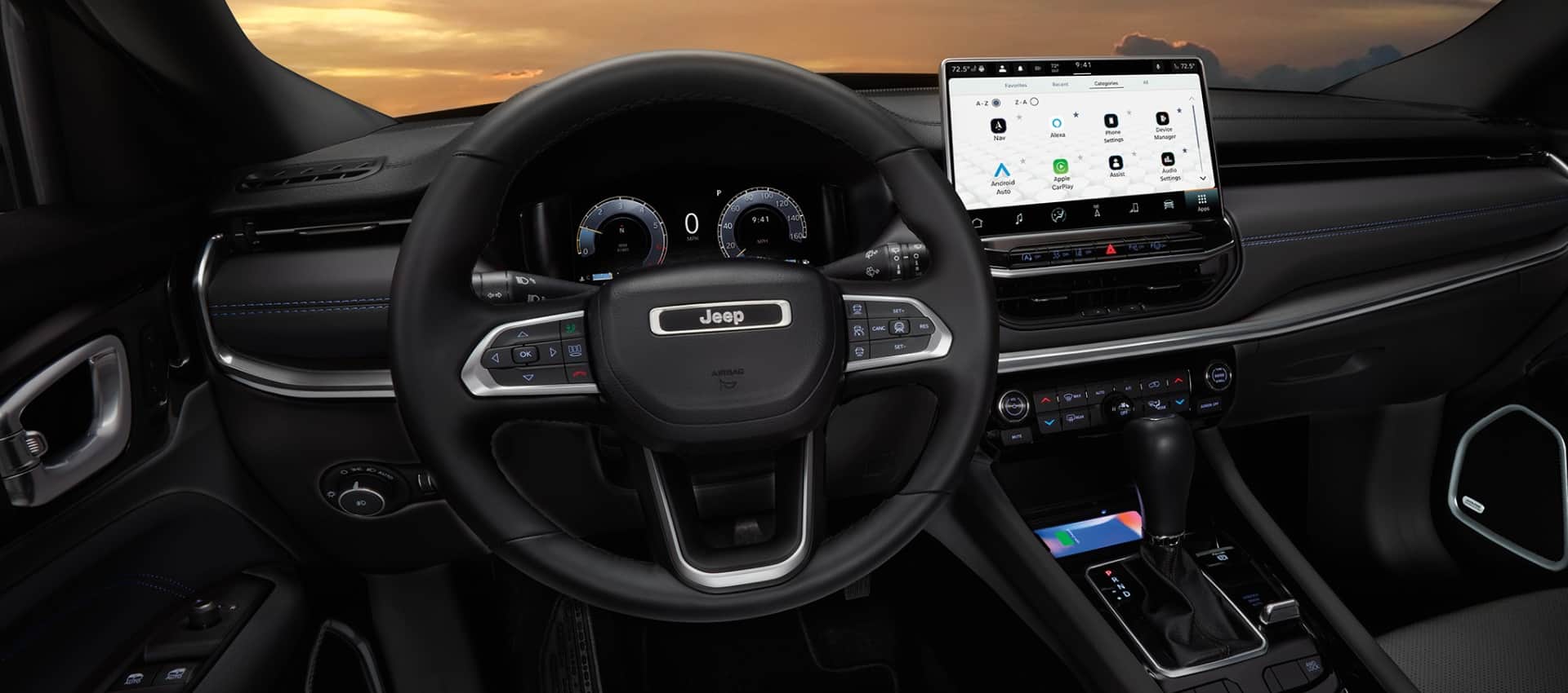 Interior view of the 2027 Jeep Compass with the steering wheel, dashboard and center display visible.