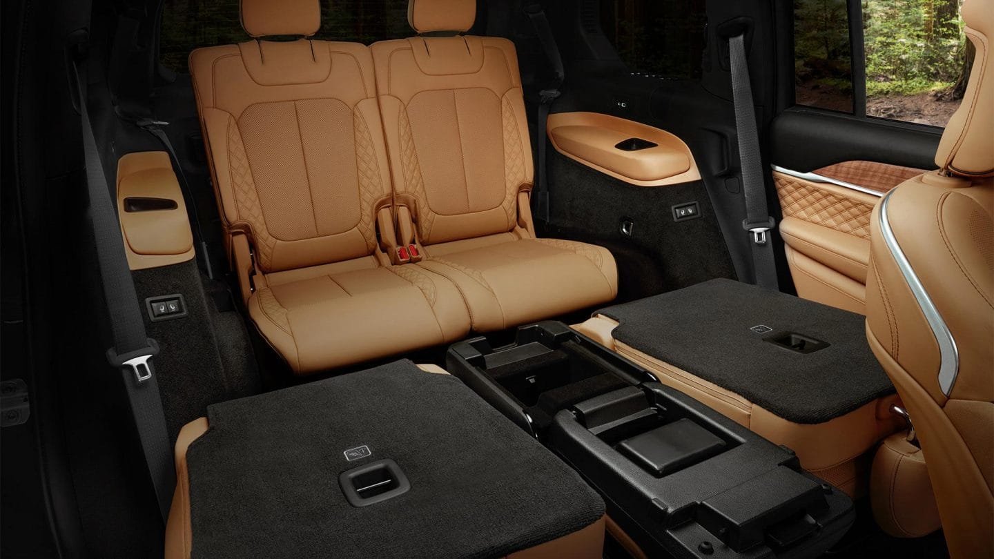 The interior of the 2027 Jeep Grand Cherokee L Summit with the second-row seats folded and the third-row seats upright.