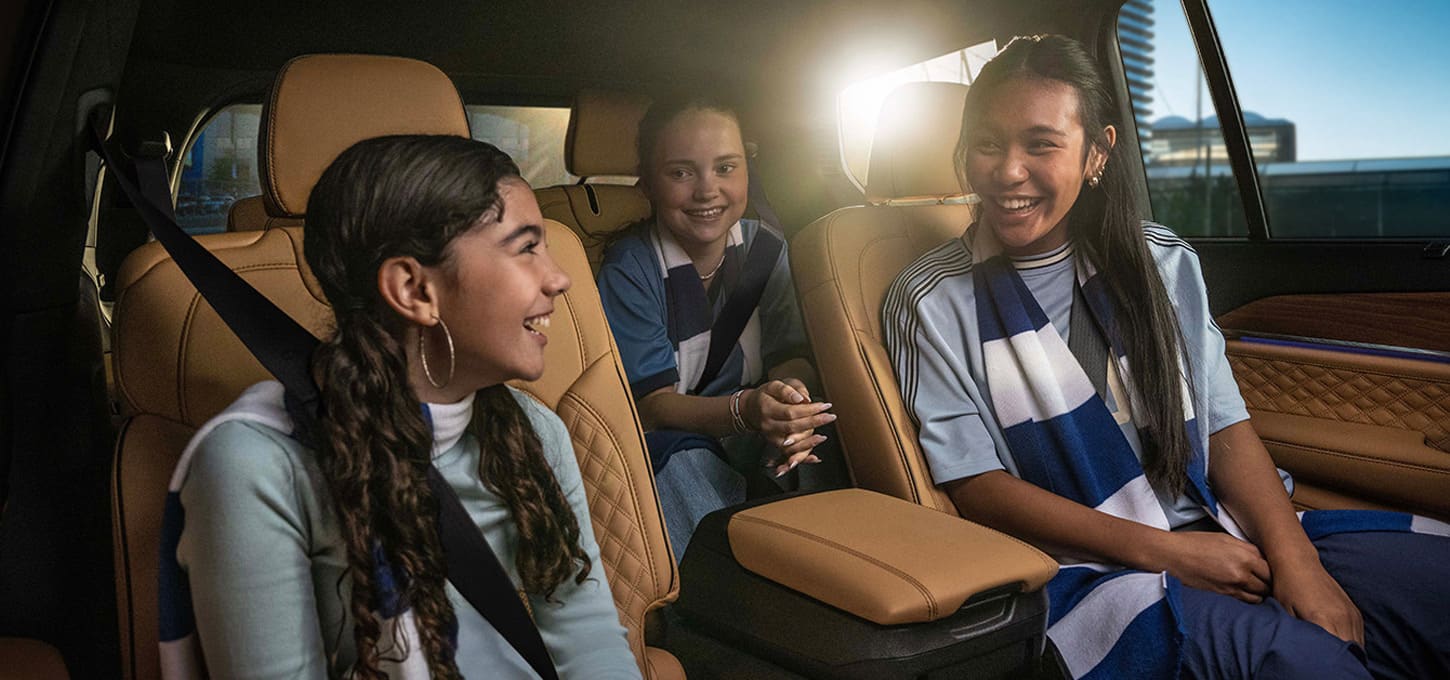 Passengers in the second row of a Jeep Grand Cherokee