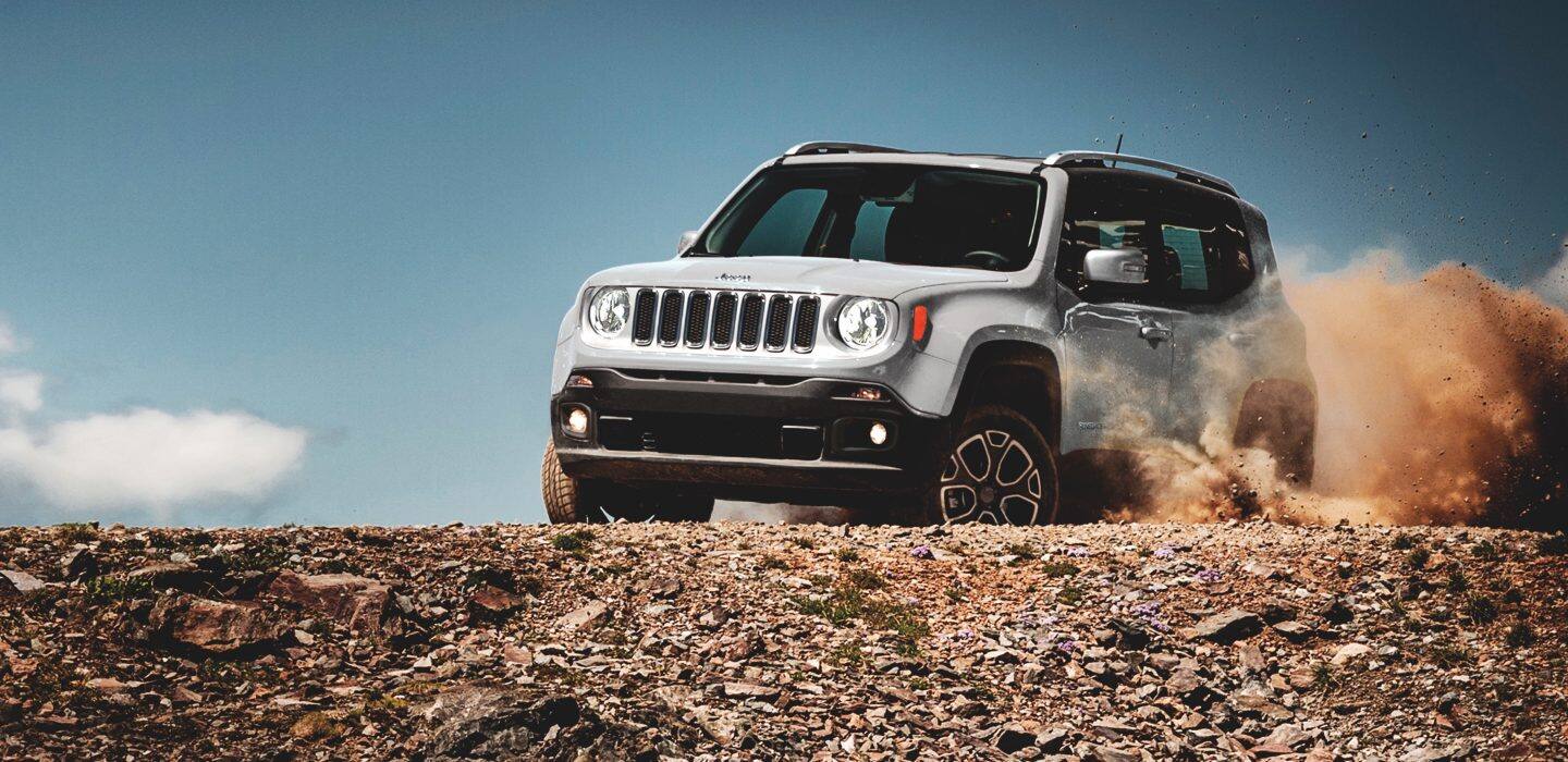 Jeep Renegade being driven on rocky terrain.