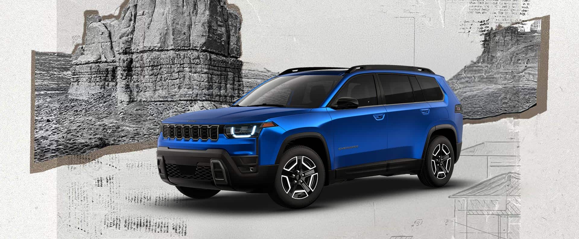 A driver-side front angle of a blue 2026 Jeep Cherokee Laredo.