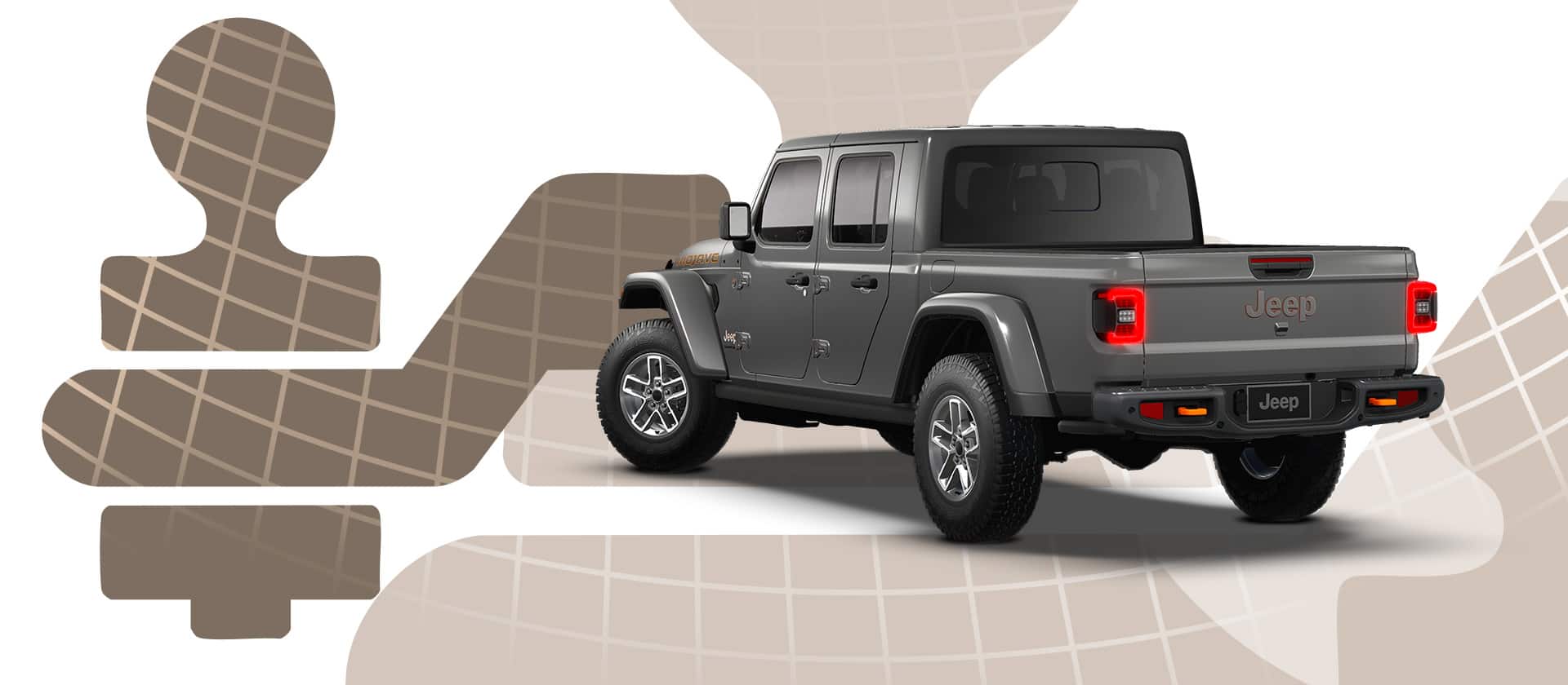 A driver-side rear angle of a dark gray 2026 Jeep Gladiator Mojave X.