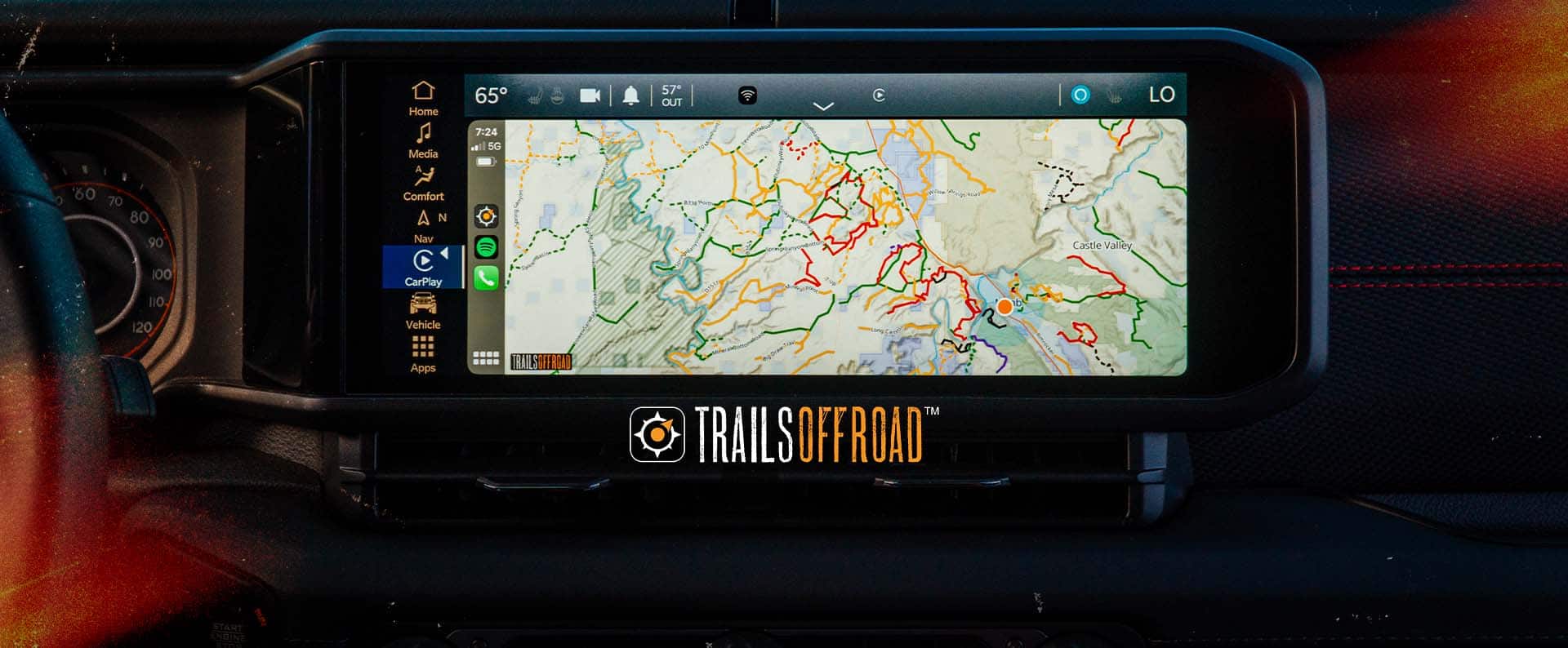 The Uconnect touchscreen in a Jeep TBD, displaying a map from the Off-Road Trails Guide. Trails Off Road.