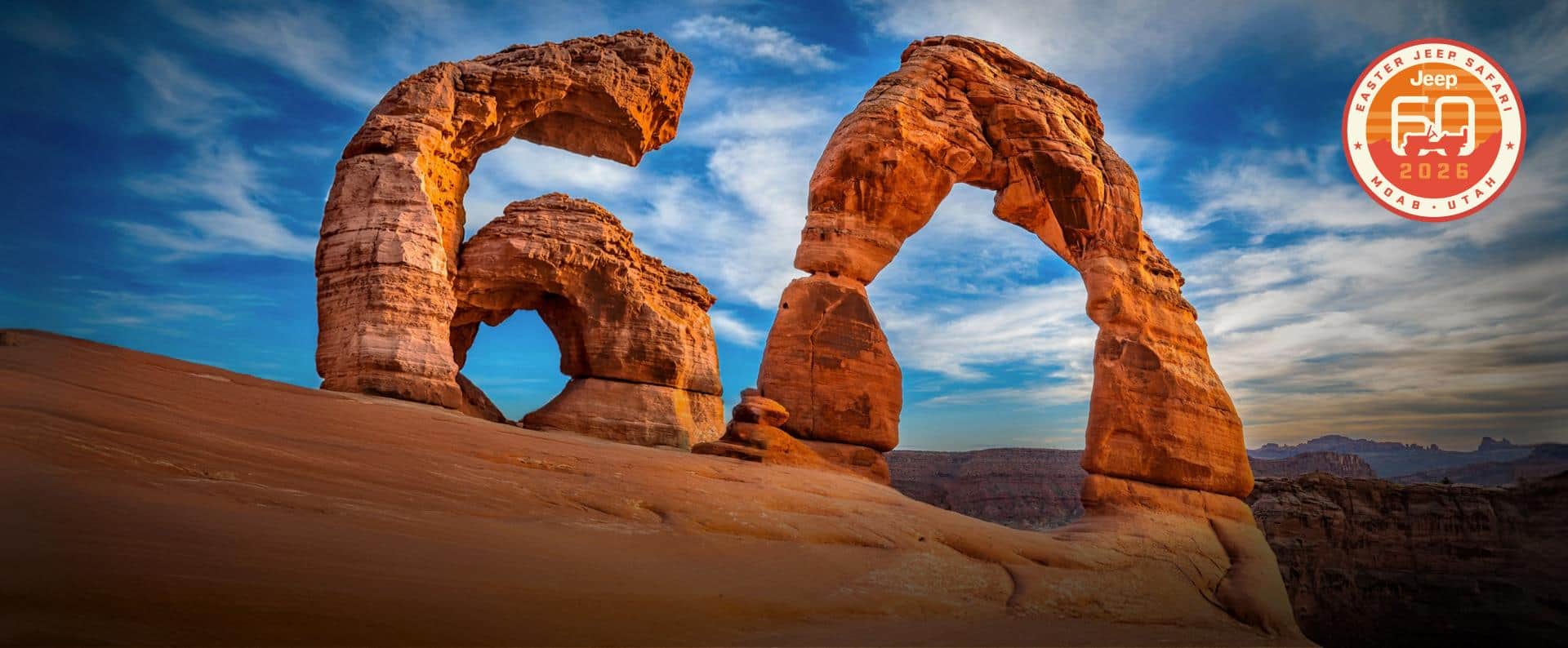 Sandstone formations in the desert pieced together to resemble the number 60. Easter Jeep Safari. Jeep 60 2026. Moab, Utah.