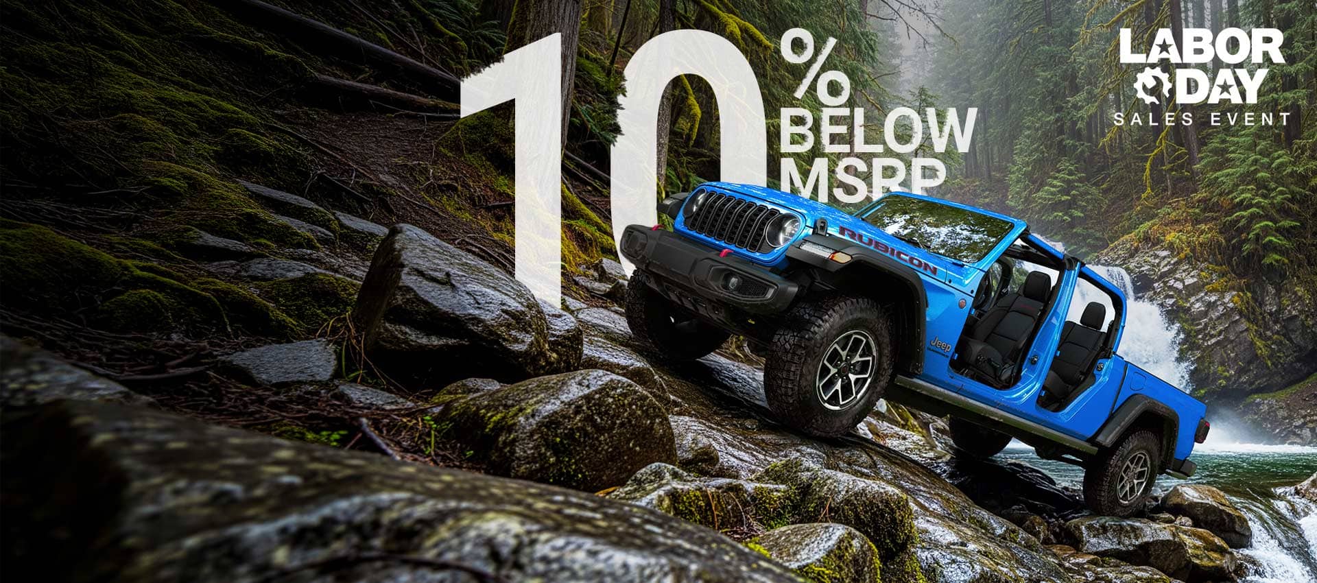 A blue 2026 Jeep Gladiator Rubicon with its doors and top removed, parked on a steep, rocky trail, just above a rapid stream with a waterfall in the background. Labor Day Sales Event.