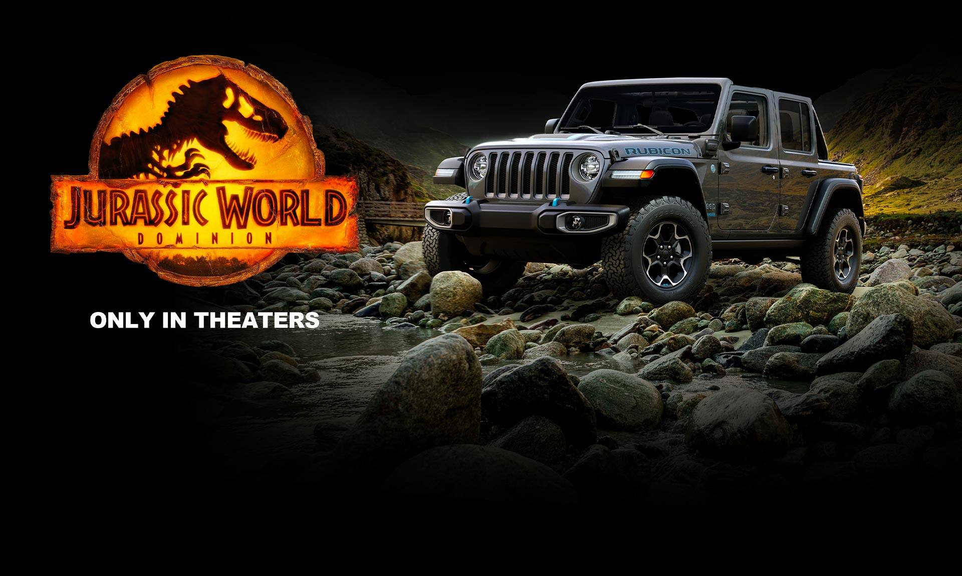 Jurassic World Dominion. A 2022 Jeep Wrangler Rubicon 4xe parked on rocky terrain.