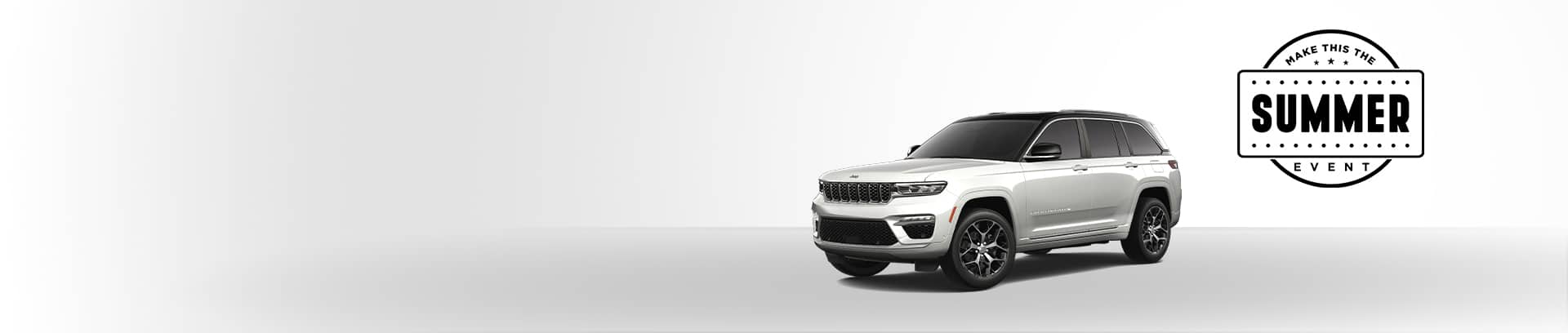 A white 2025 Jeep Grand Cherokee Summit Reserve.