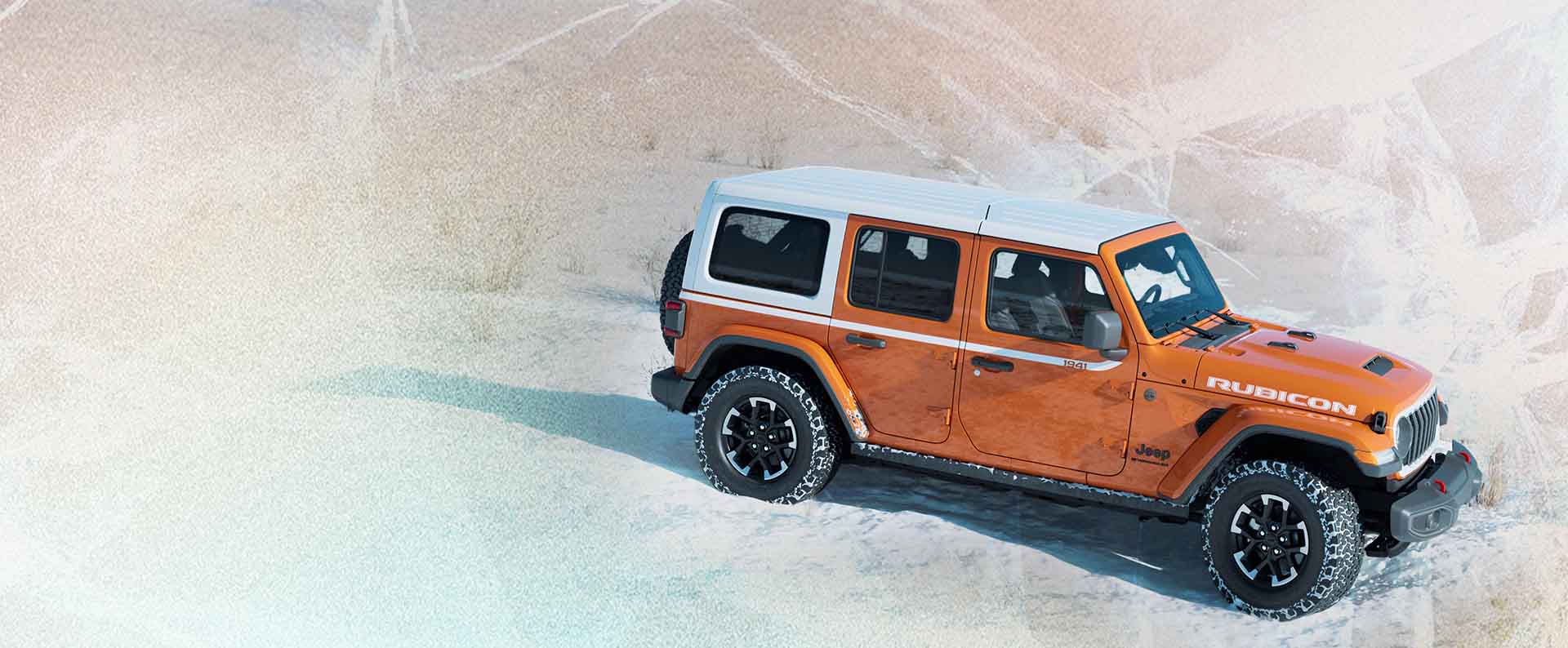 A raised angle of an orange 2026 Jeep Wrangler Rubicon Whitecap on a snow-covered background, highlighting its white roof and white side stripe.