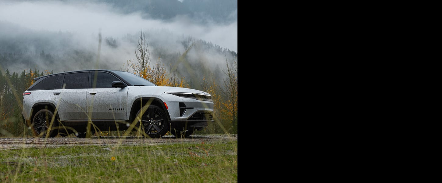 A white 2024 Jeep Wagoneer S Launch Edition on a trail off-road.